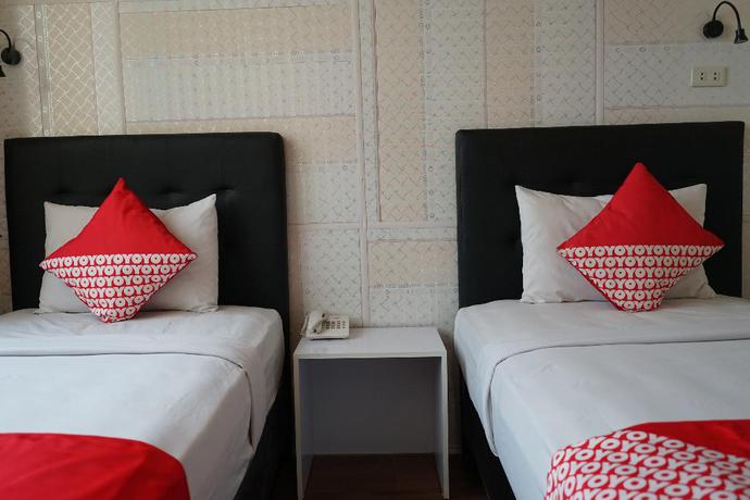 Imagen de la habitación del Hotel OYO 633 Ren Z Hotel. Foto 8