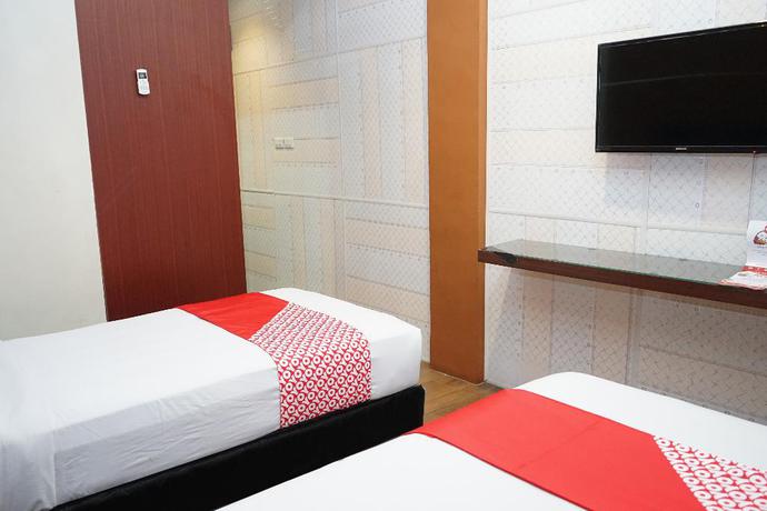 Imagen de la habitación del Hotel OYO 633 Ren Z Hotel. Foto 12