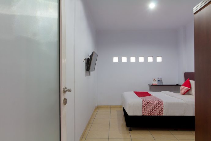Imagen de la habitación del Hotel OYO 645 Griya Mas Syariah. Foto 3