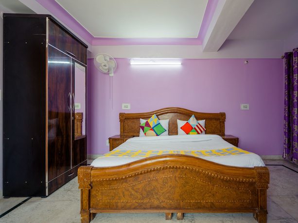 Imagen de la habitación del Hotel OYO 6478 Green Land. Foto 10
