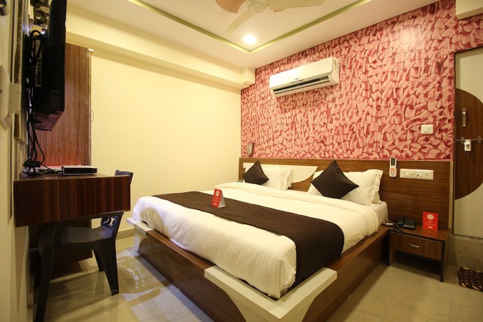 Imagen de la habitación del Hotel OYO 6478 Green Land. Foto 17