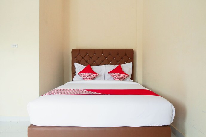 Imagen de la habitación del Hotel OYO 654 Fabio Guest House Syariah. Foto 9