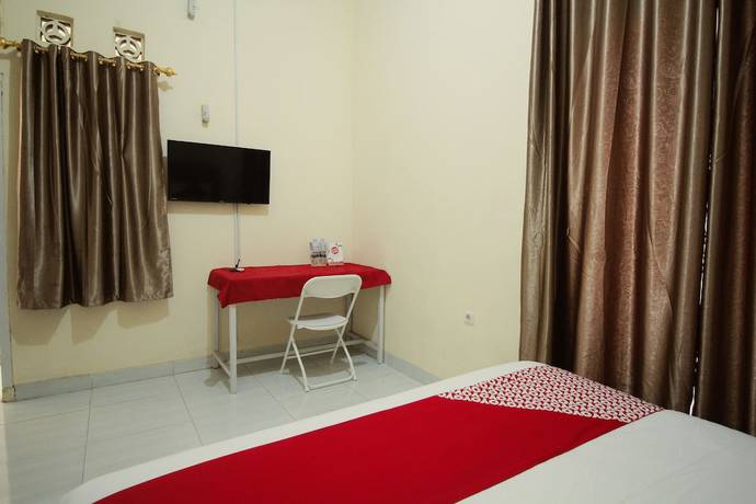 Imagen de la habitación del Hotel OYO 654 Fabio Guest House Syariah. Foto 10