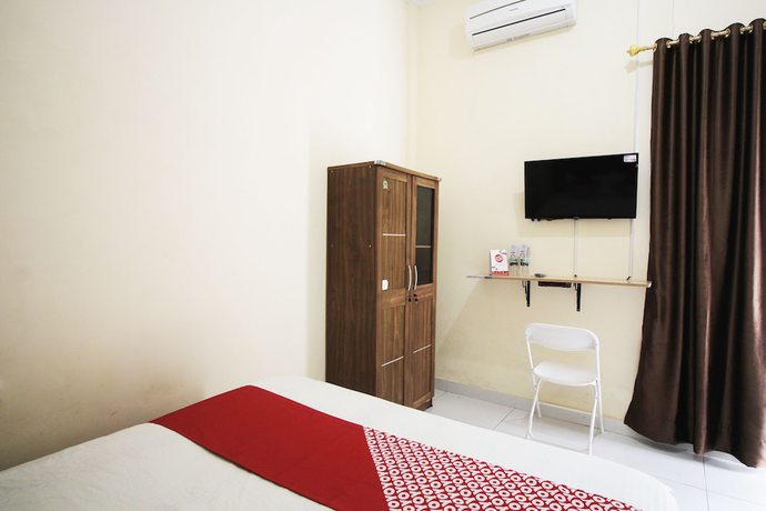 Imagen de la habitación del Hotel OYO 654 Fabio Guest House Syariah. Foto 17