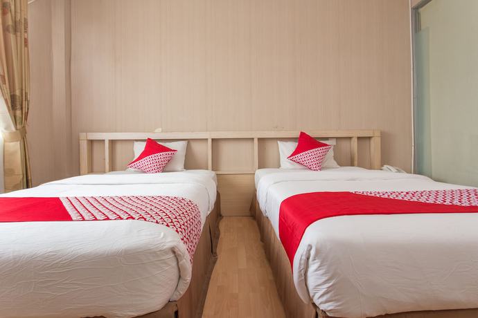 Imagen de la habitación del Hotel OYO 663 Sejati. Foto 2
