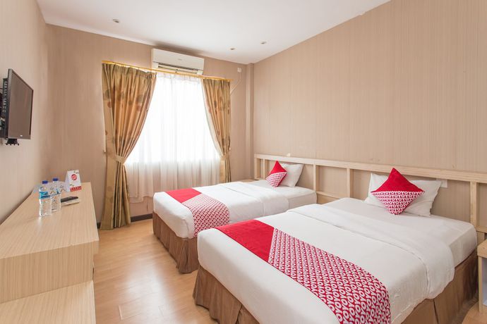 Imagen de la habitación del Hotel OYO 663 Sejati. Foto 8