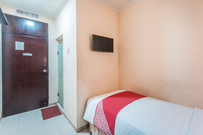 Imagen de la habitación del Hotel OYO 671 Capitol. Foto 2