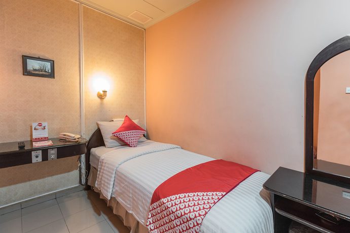 Imagen de la habitación del Hotel OYO 671 Capitol. Foto 3