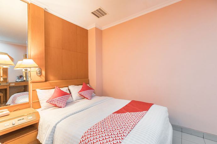 Imagen de la habitación del Hotel OYO 671 Capitol. Foto 4
