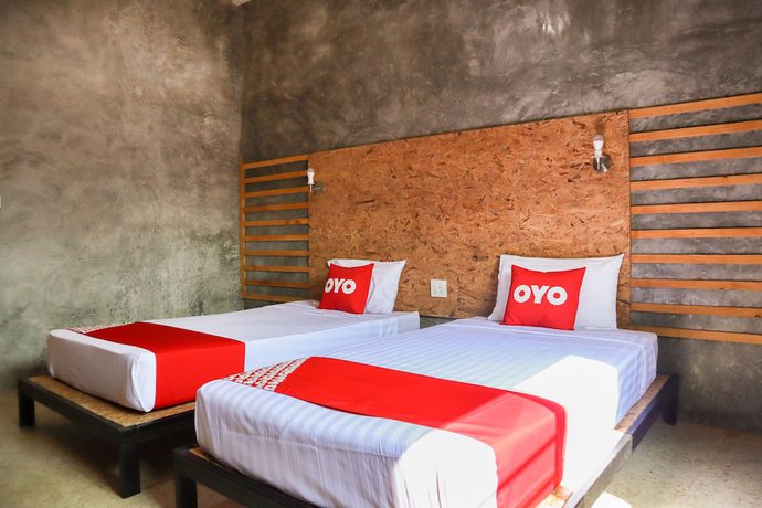 Imagen de la habitación del Hotel OYO 674 Greenery Home. Foto 15