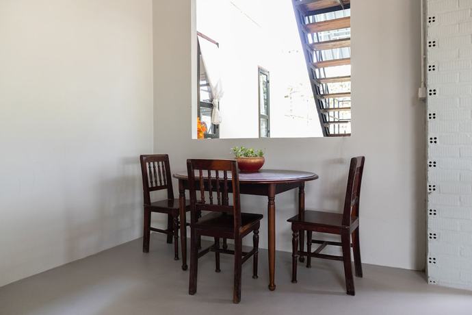 Imagen del bar/restaurante del Hotel OYO 674 Greenery Home. Foto 2