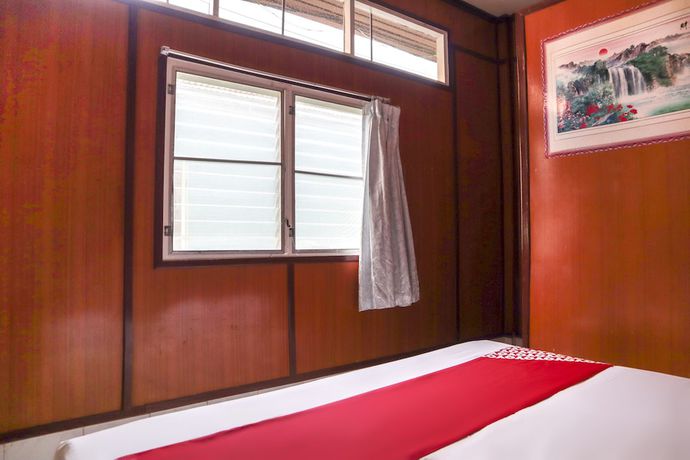 Imagen de la habitación del Hotel OYO 681 Paradise. Foto 14