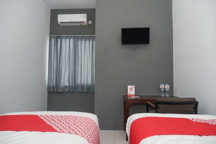 Imagen de la habitación del Hotel OYO 682 Ceria Homestay Syariah. Foto 2