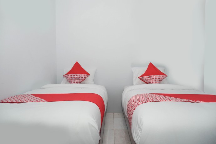 Imagen de la habitación del Hotel OYO 682 Ceria Homestay Syariah. Foto 3