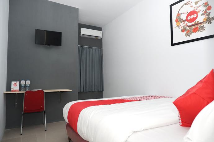 Imagen de la habitación del Hotel OYO 682 Ceria Homestay Syariah. Foto 5