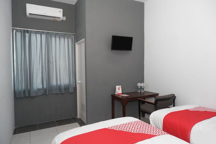 Imagen de la habitación del Hotel OYO 682 Ceria Homestay Syariah. Foto 6