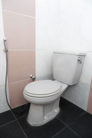 Imagen de la habitación del Hotel OYO 682 Ceria Homestay Syariah. Foto 9