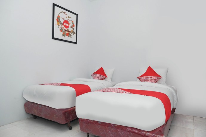 Imagen de la habitación del Hotel OYO 682 Ceria Homestay Syariah. Foto 10