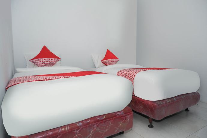 Imagen de la habitación del Hotel OYO 682 Ceria Homestay Syariah. Foto 12