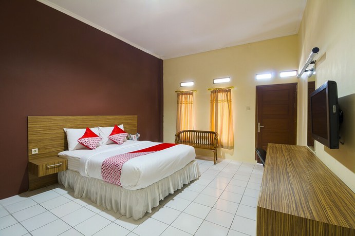 Imagen de la habitación del Hotel OYO 688 Grand Pakidulan. Foto 10