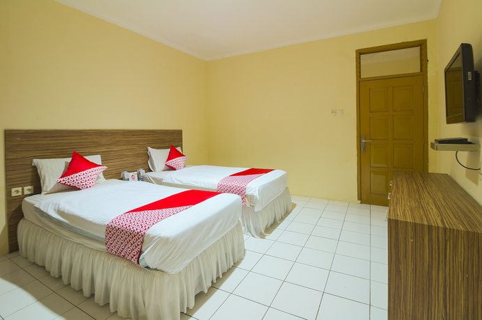 Imagen de la habitación del Hotel OYO 688 Grand Pakidulan. Foto 16