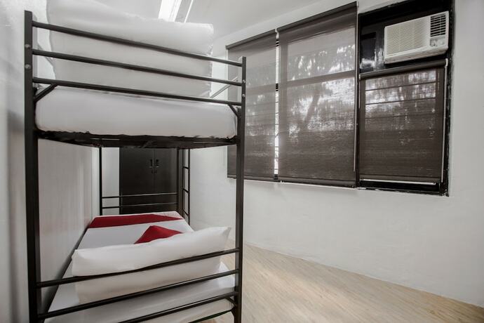 Imagen de la habitación del Hotel OYO 688 Monchere Dormitory. Foto 4