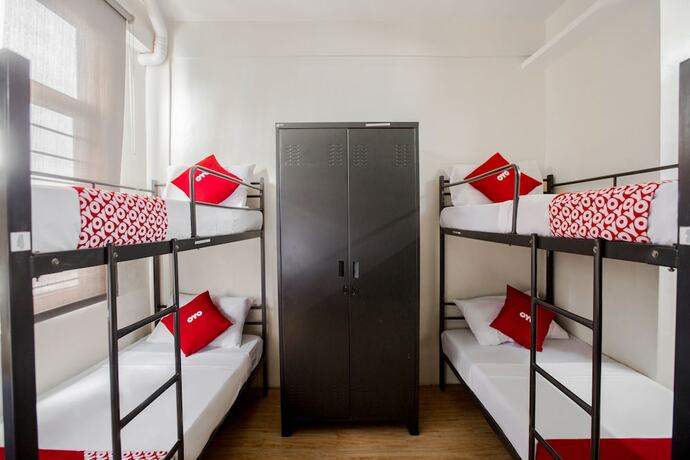 Imagen de la habitación del Hotel OYO 688 Monchere Dormitory. Foto 7