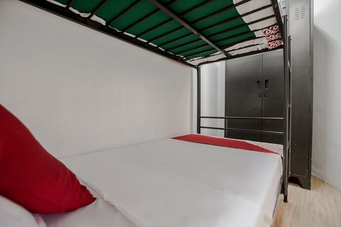 Imagen de la habitación del Hotel OYO 688 Monchere Dormitory. Foto 8