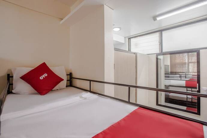 Imagen de la habitación del Hotel OYO 688 Monchere Dormitory. Foto 9