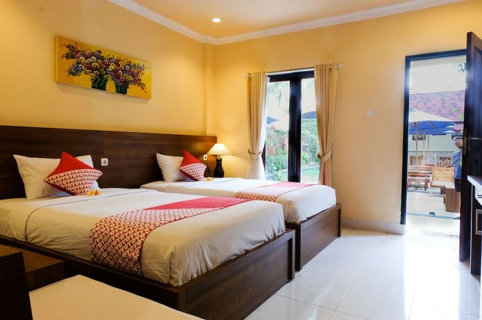 Imagen de la habitación del Hotel OYO 706 My Home One Gili Trawangan. Foto 7