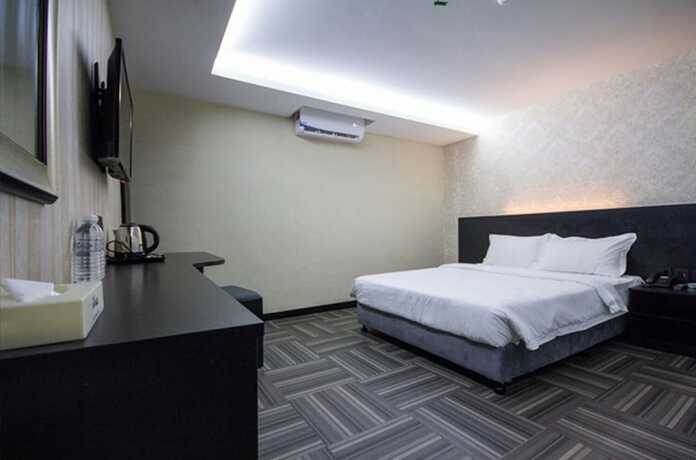 Imagen de la habitación del Hotel OYO 708 S Hotel. Foto 31