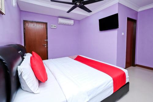 Imagen de la habitación del Hotel OYO 714 Arina. Foto 6