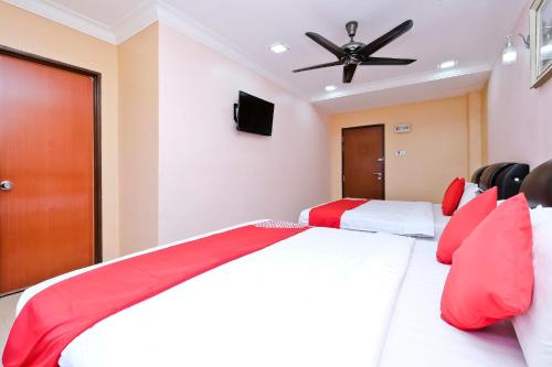 Imagen de la habitación del Hotel OYO 714 Arina. Foto 8