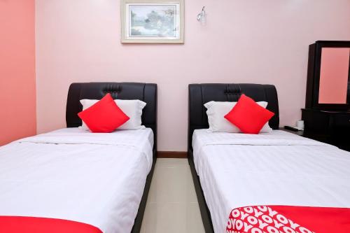 Imagen de la habitación del Hotel OYO 714 Arina. Foto 9