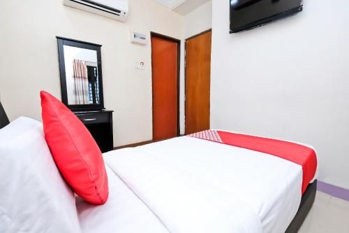 Imagen de la habitación del Hotel OYO 714 Arina. Foto 10