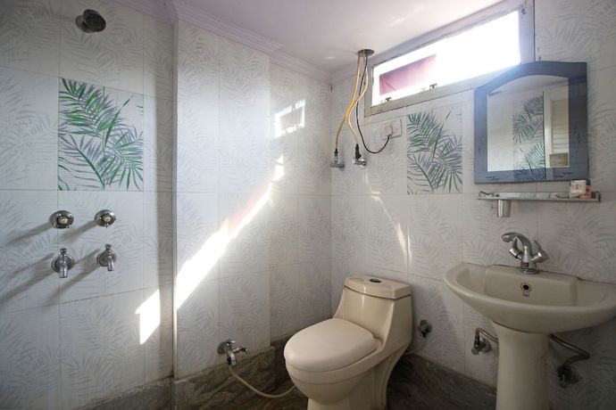 Imagen de la habitación del Hotel OYO 7147 Madhur Regency. Foto 11