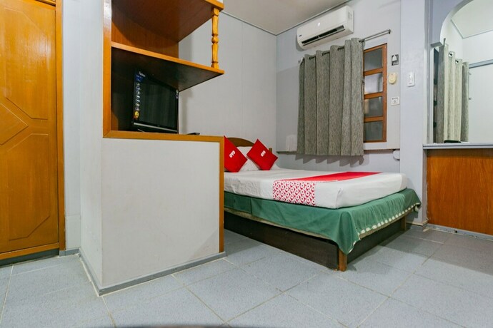 Imagen de la habitación del Hotel OYO 722 Slouch Hat Inn. Foto 12