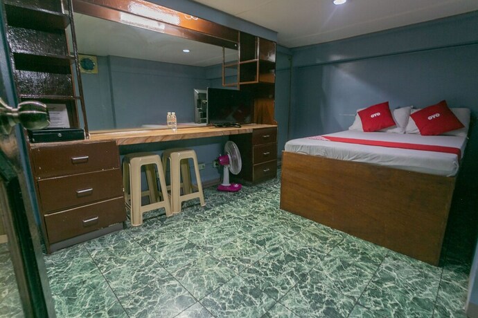 Imagen de la habitación del Hotel OYO 722 Slouch Hat Inn. Foto 19