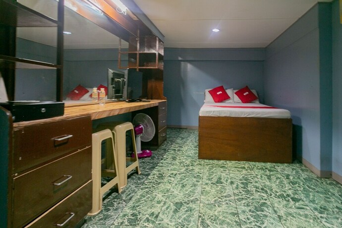 Imagen de la habitación del Hotel OYO 722 Slouch Hat Inn. Foto 21
