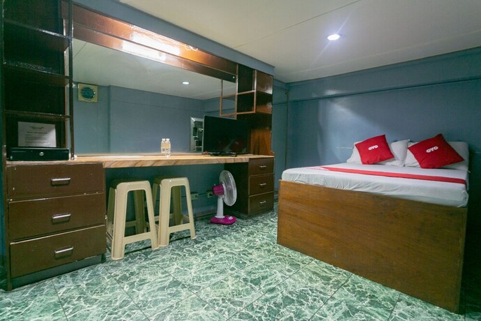 Imagen de la habitación del Hotel OYO 722 Slouch Hat Inn. Foto 22