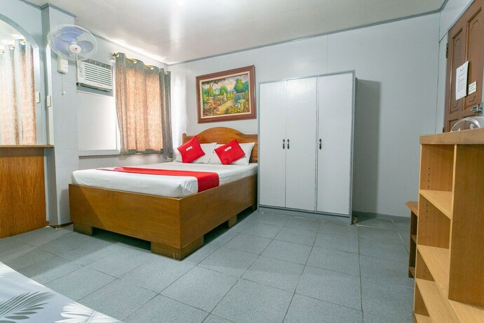 Imagen de la habitación del Hotel OYO 722 Slouch Hat Inn. Foto 26