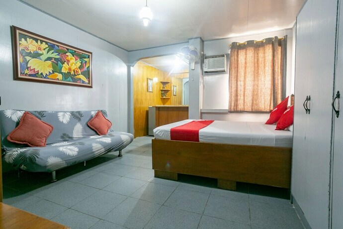 Imagen de la habitación del Hotel OYO 722 Slouch Hat Inn. Foto 36