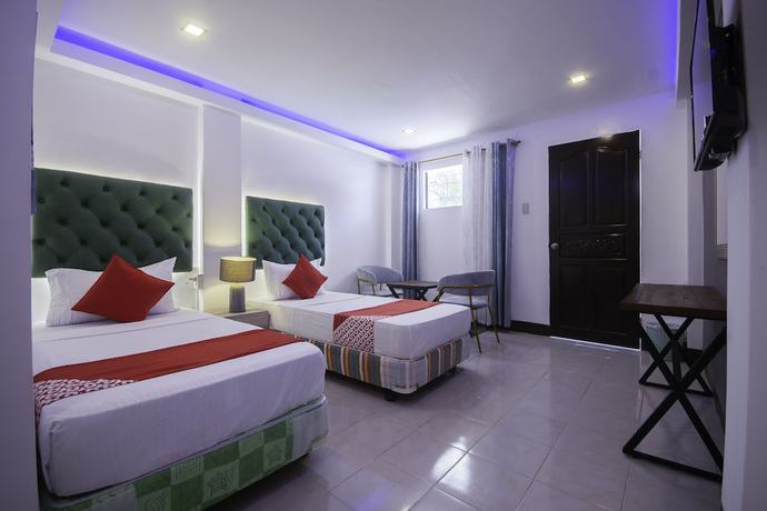 Imagen de la habitación del Hotel OYO 725 Richdel Resort. Foto 3