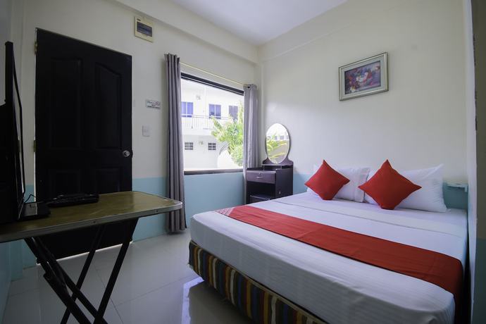 Imagen de la habitación del Hotel OYO 725 Richdel Resort. Foto 4