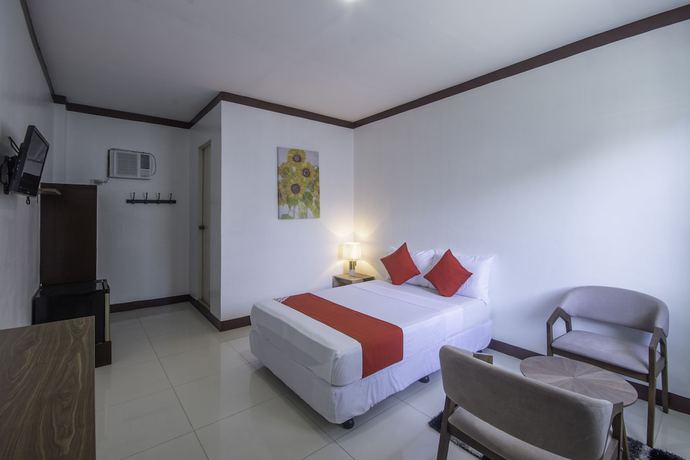 Imagen de la habitación del Hotel OYO 725 Richdel Resort. Foto 8