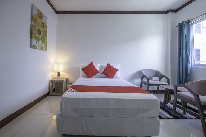 Imagen de la habitación del Hotel OYO 725 Richdel Resort. Foto 9
