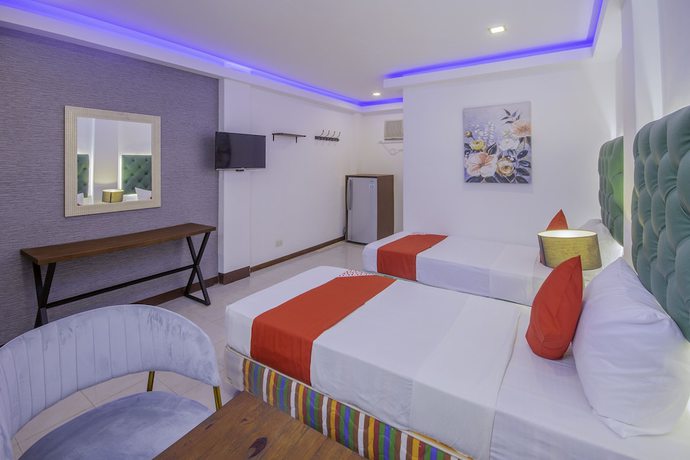 Imagen de la habitación del Hotel OYO 725 Richdel Resort. Foto 14