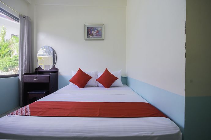 Imagen de la habitación del Hotel OYO 725 Richdel Resort. Foto 16