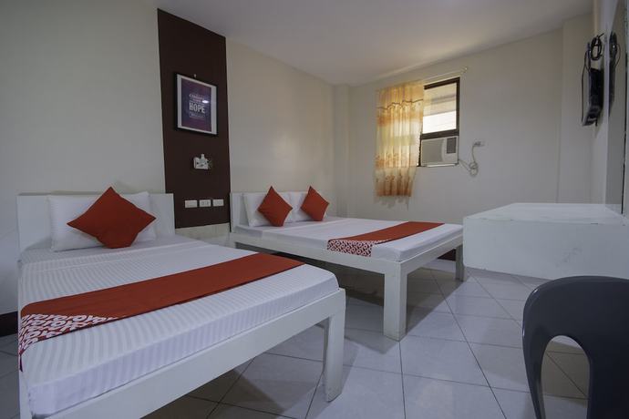 Imagen de la habitación del Hotel OYO 725 Richdel Resort. Foto 17