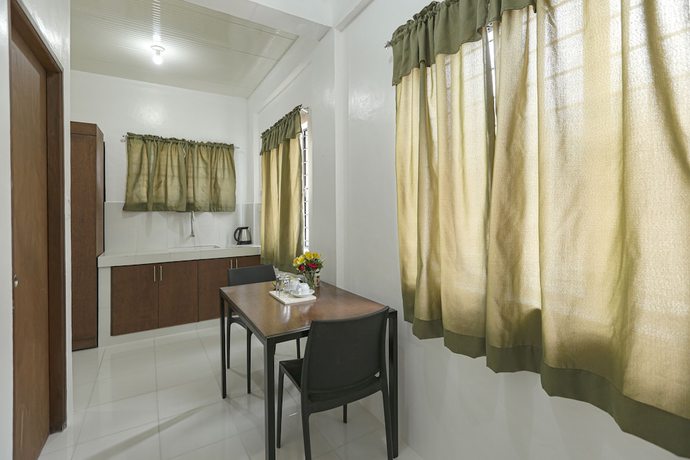 Imagen de la habitación del Hotel OYO 736 Jade Apartelle. Foto 12